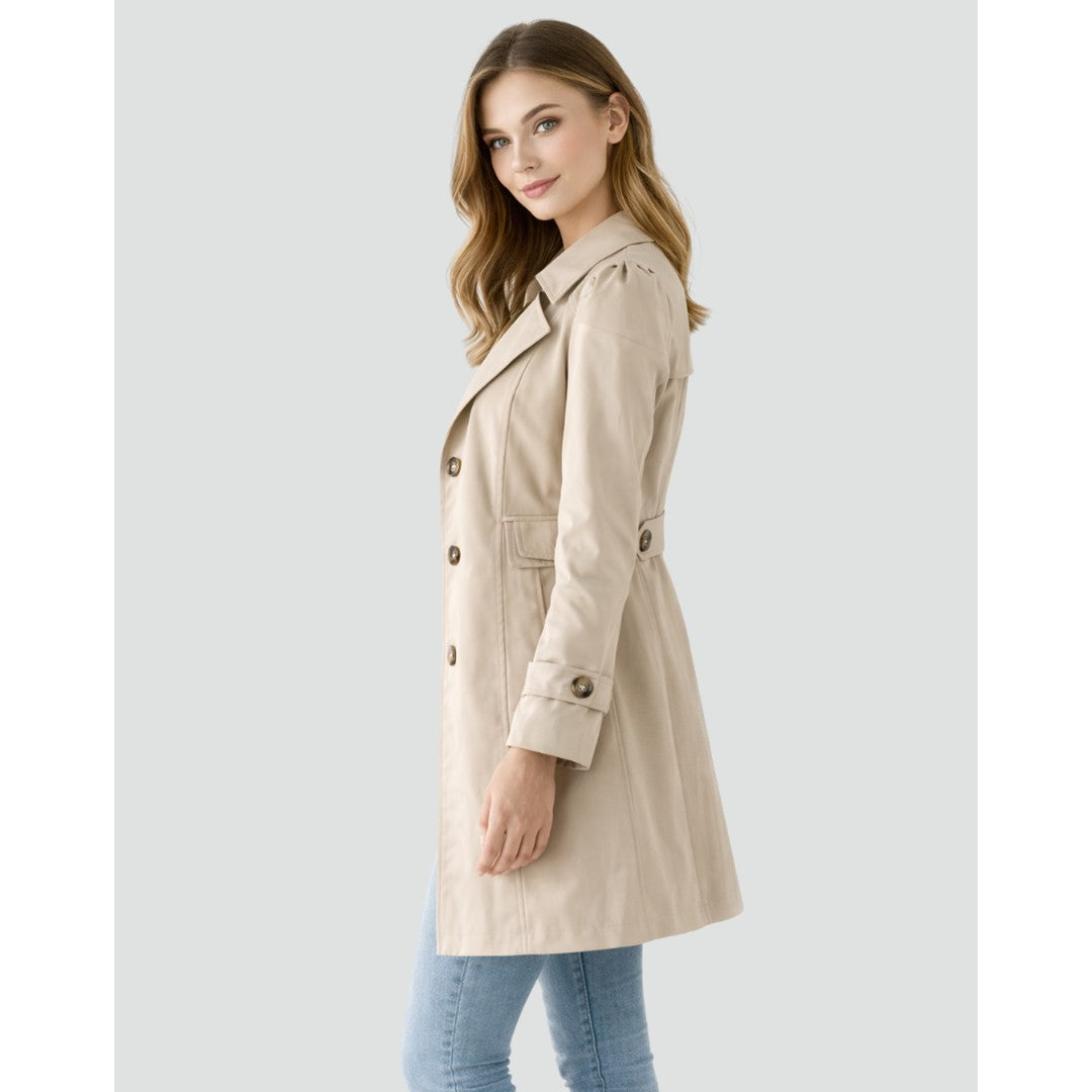 Woman wearing the Rosemary women's slim-fit collared lightweight trench coat, side view
