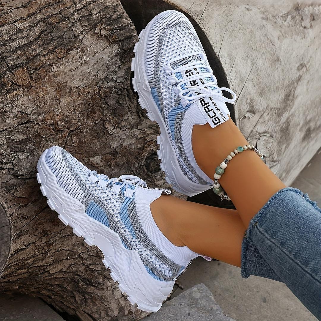 Woman wearing the Sable women's sneakers, flatlay view