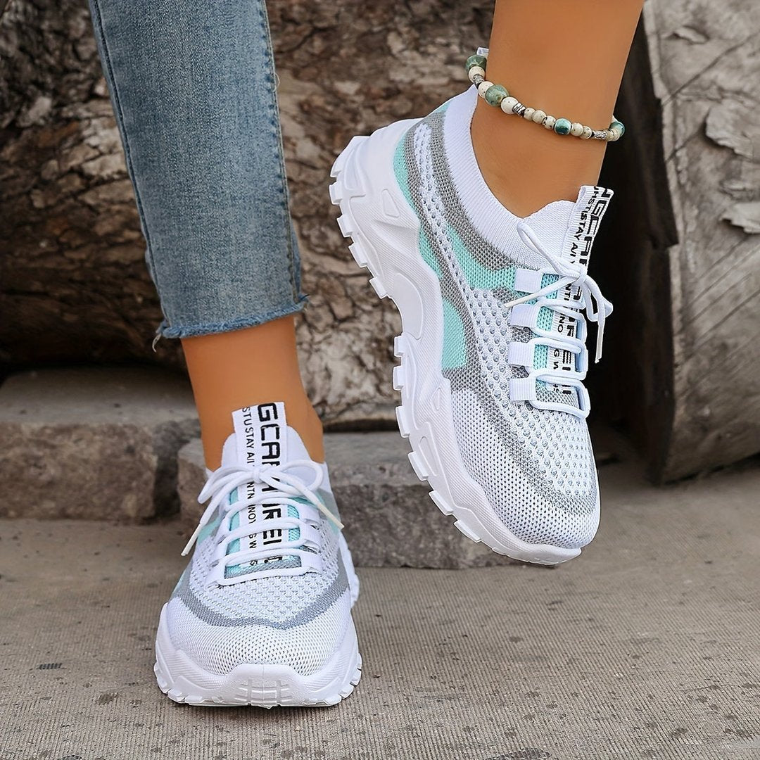 Woman wearing the Sable women's sneakers, side view