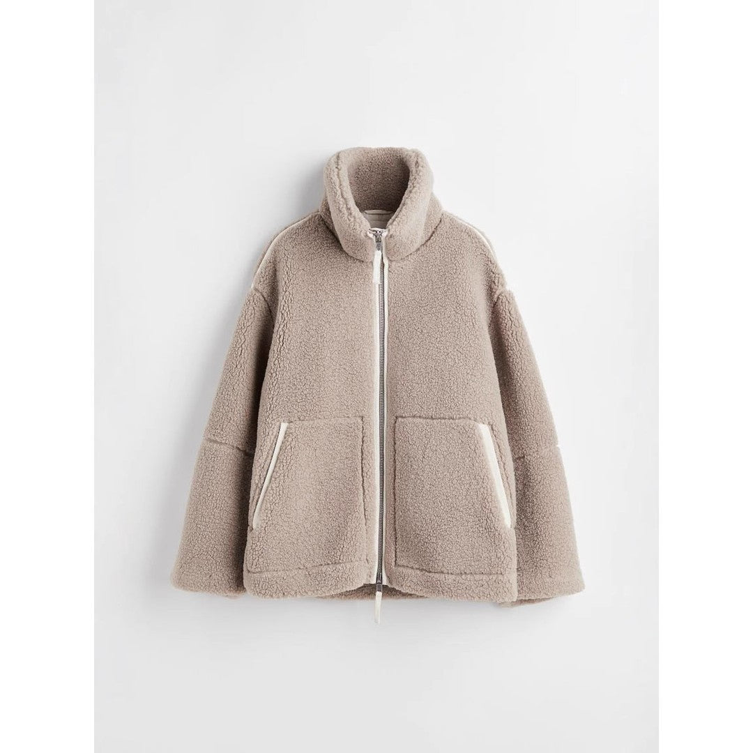 Woman wearing the Sadie women's oversized zip-up jacket, detail view