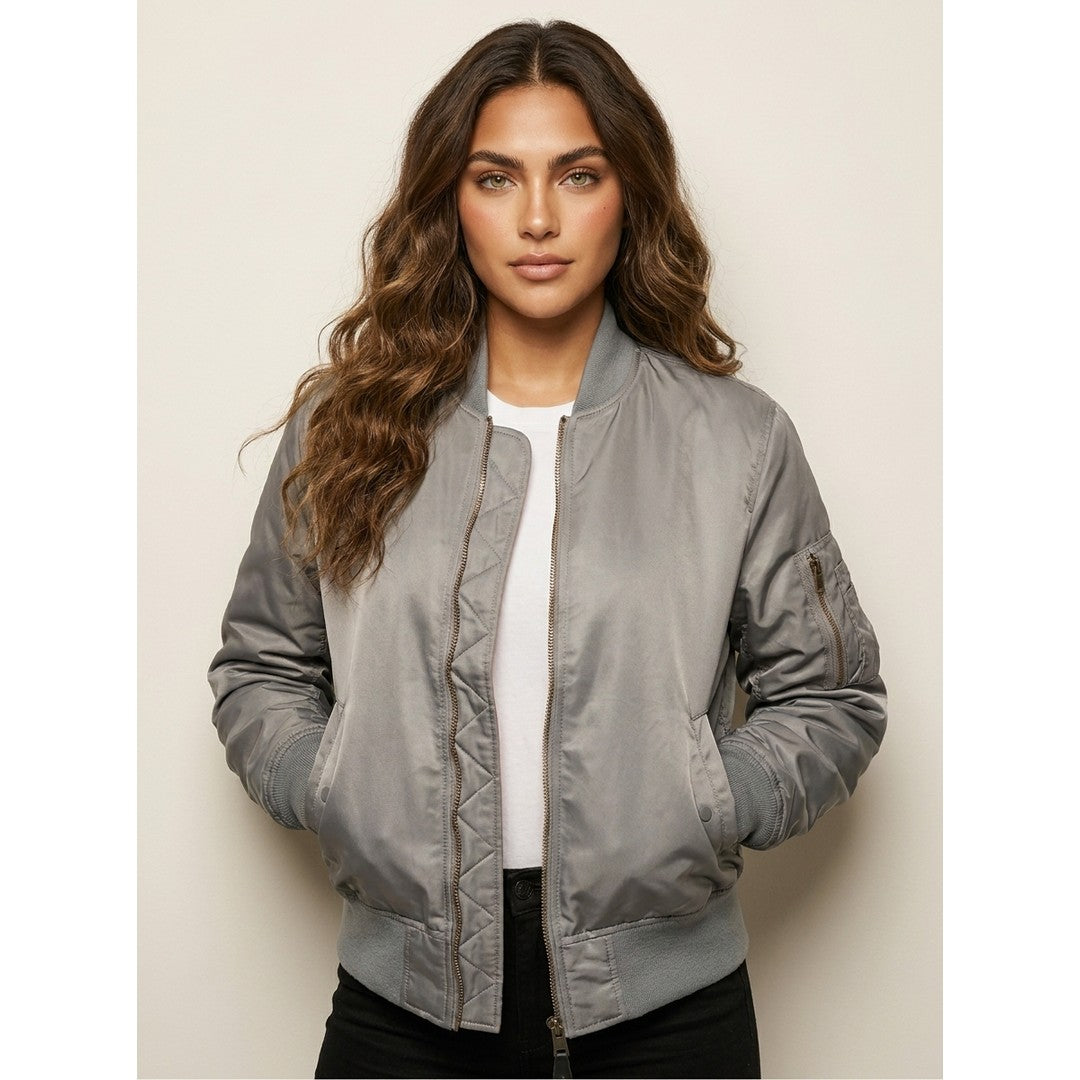 Woman wearing the Saoirse women's bomber jacket, flatlay view