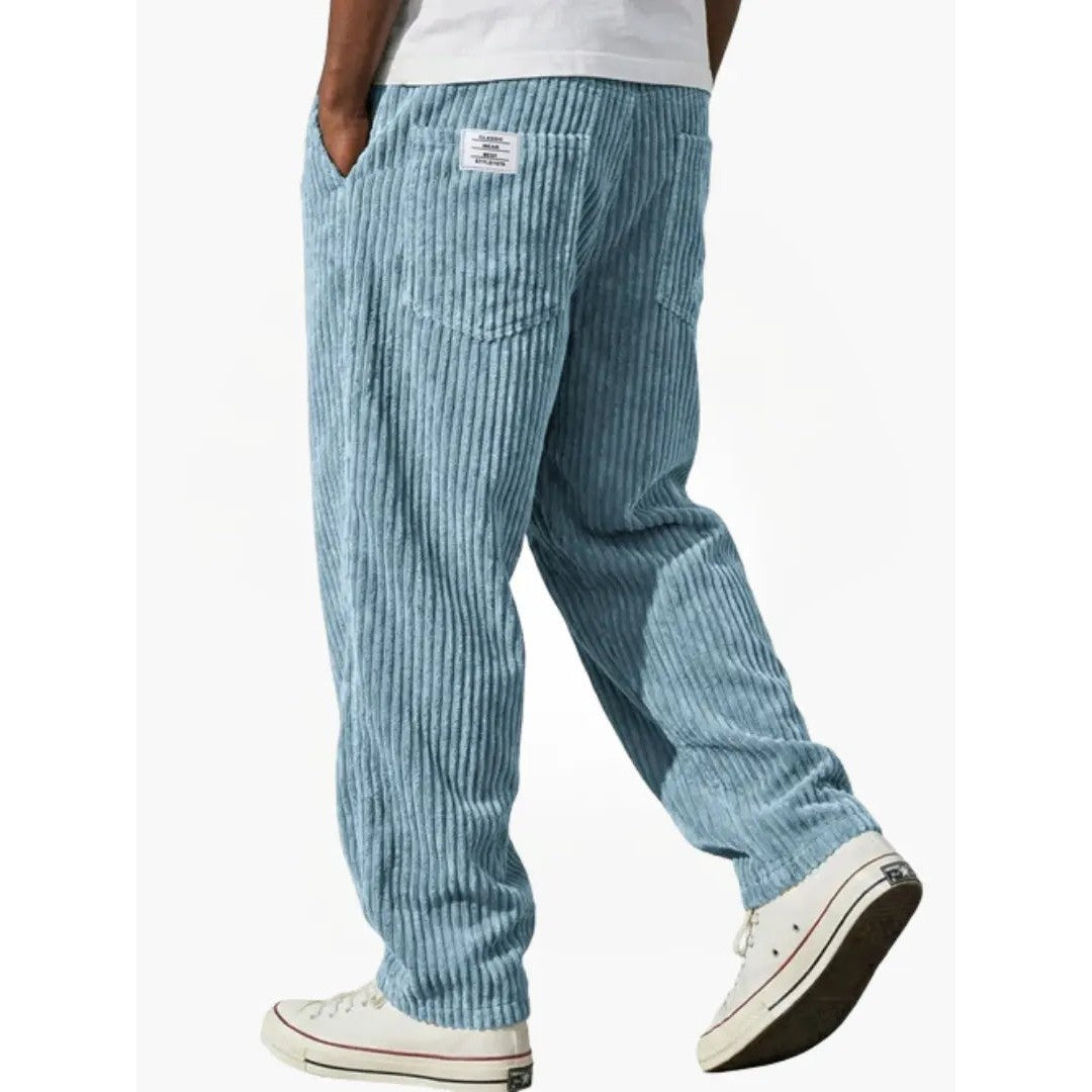 Man wearing the Sawyer men's relaxed corduroy drawstring pants, detail view
