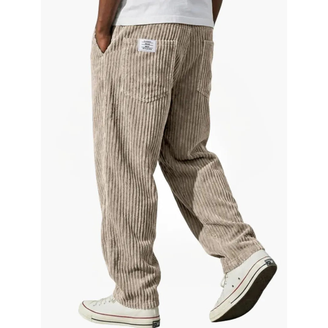 Man wearing the Sawyer men's relaxed corduroy drawstring pants, front view
