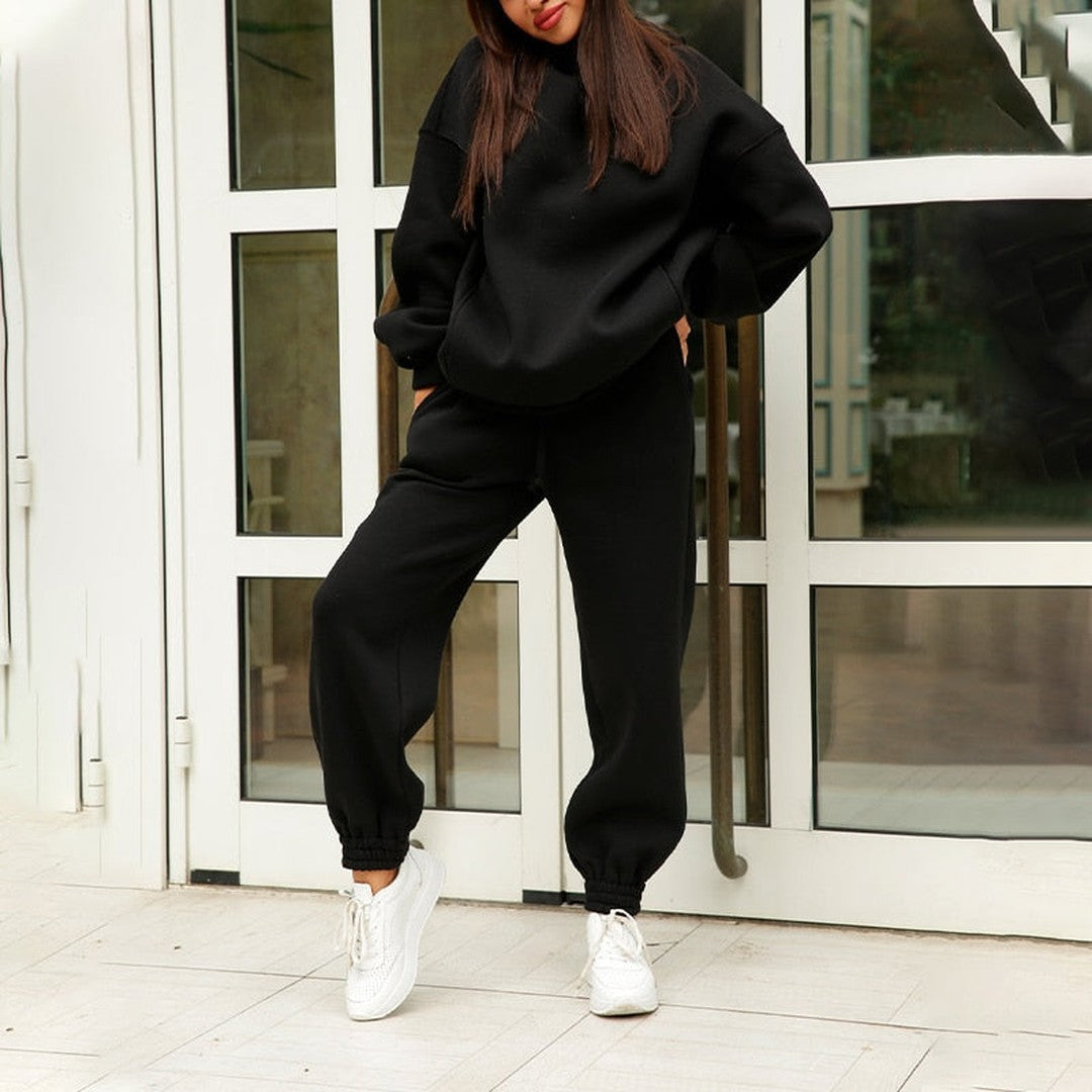Woman wearing the Sienna women's wide-leg hooded sweatshirt, front view
