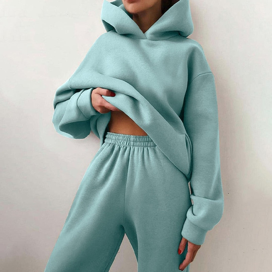 Woman wearing the Sienna women's wide-leg hooded sweatshirt, side view