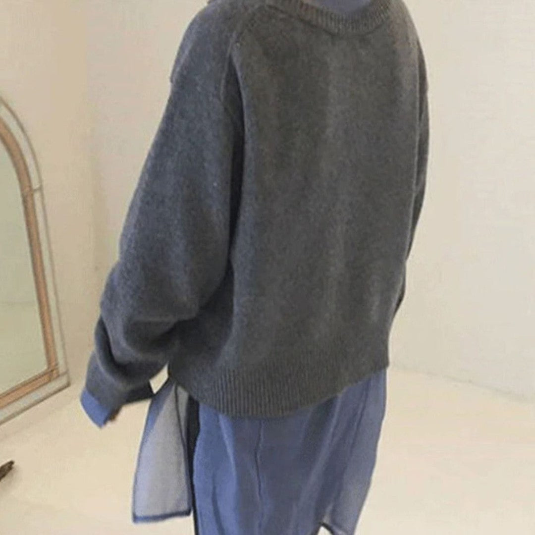 Woman wearing the Solveig women's button-up jacket, side view