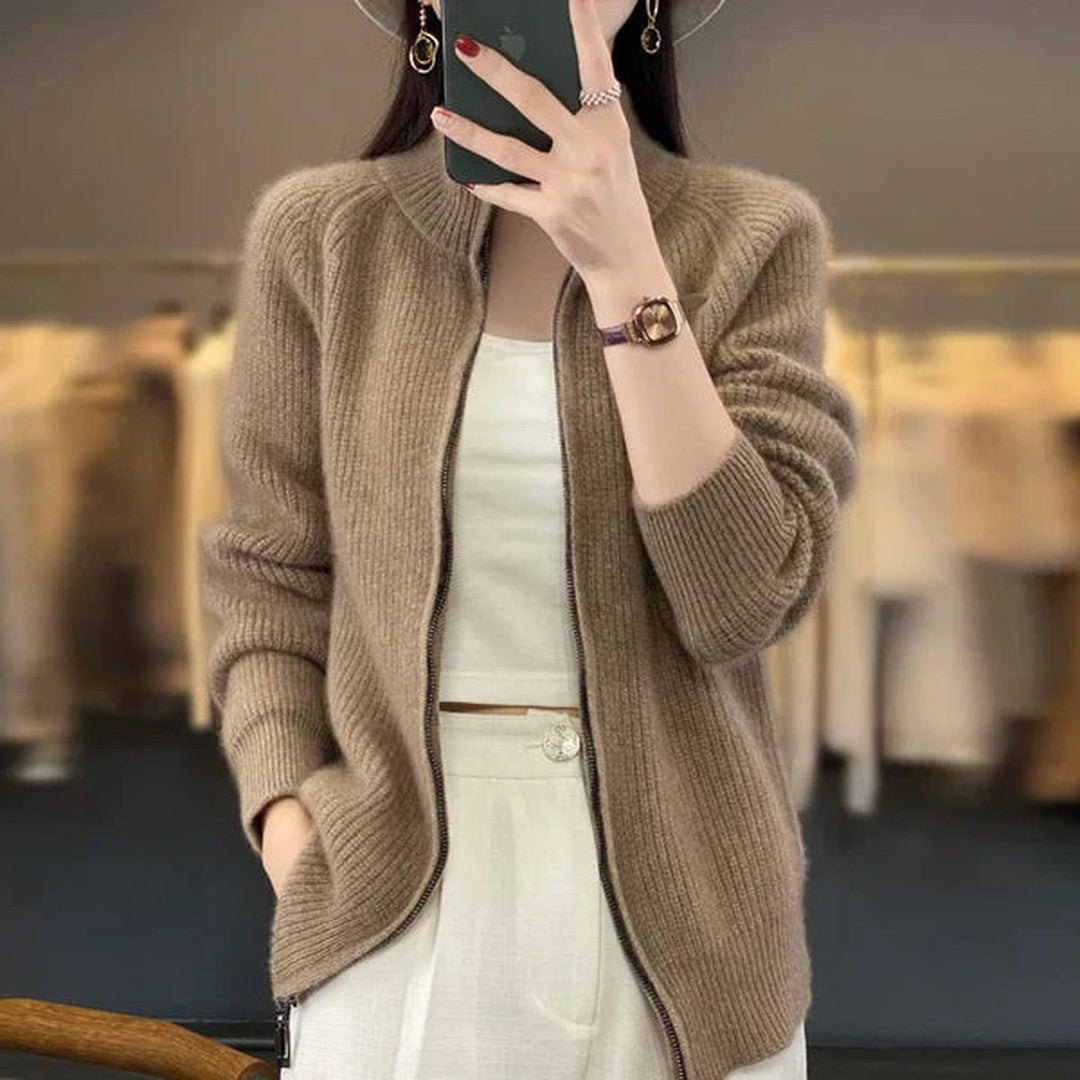 Woman wearing the Sverre women's collared zip-up cardigan, back view