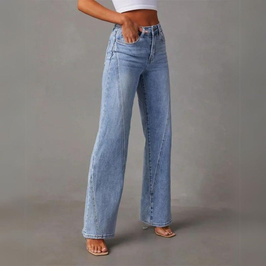 Woman wearing the Theodora women's casual denim chic jeans, side view