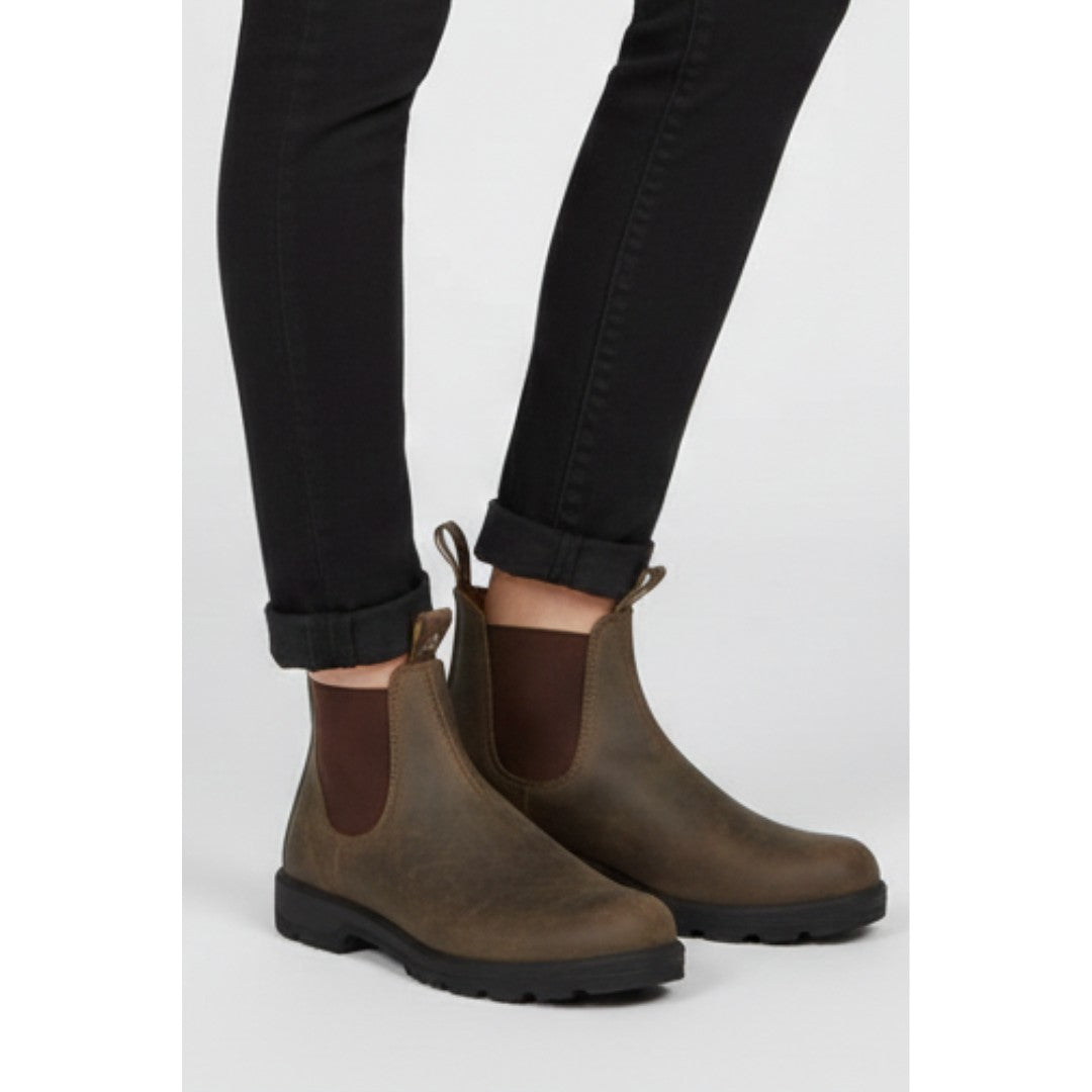 Woman wearing the Thorne women's boots, side view