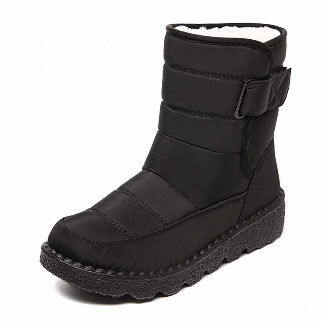 Woman wearing the Uma women's waterproof boots, model view