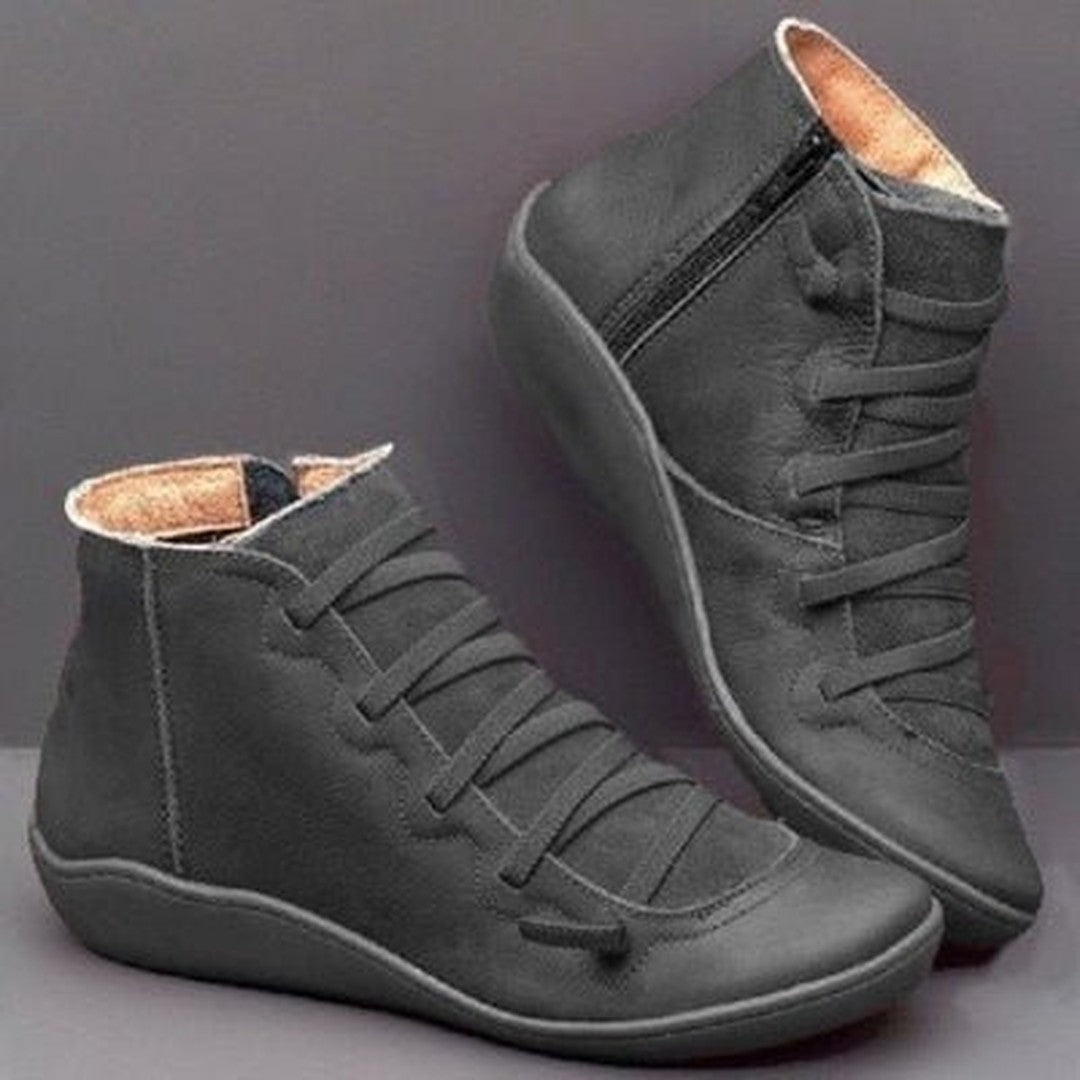 Woman wearing the Vada women's boots, flatlay view