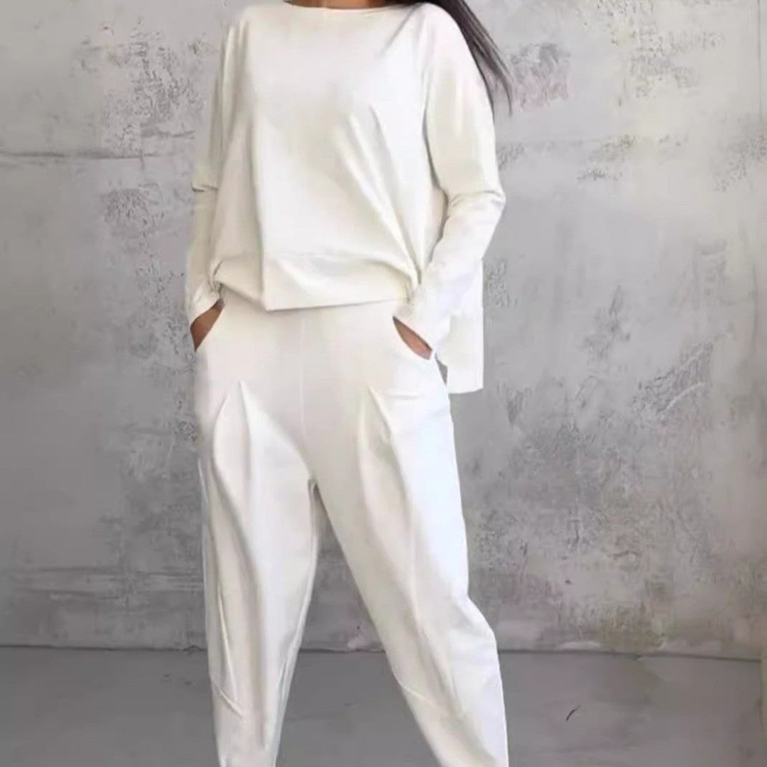 Woman wearing the Veda women's wide-leg dress, back view