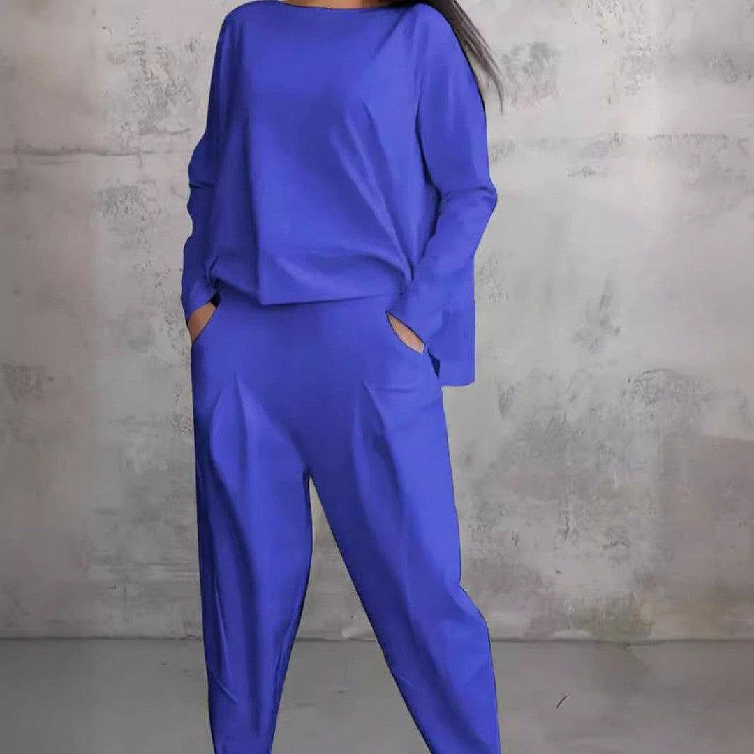 Woman wearing the Veda women's wide-leg dress, model view