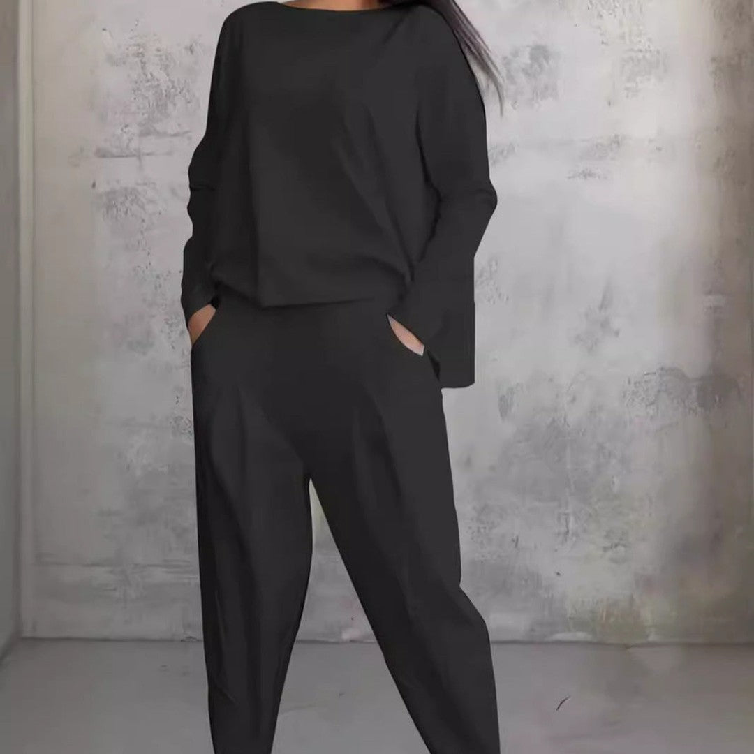 Woman wearing the Veda women's wide-leg dress, side view