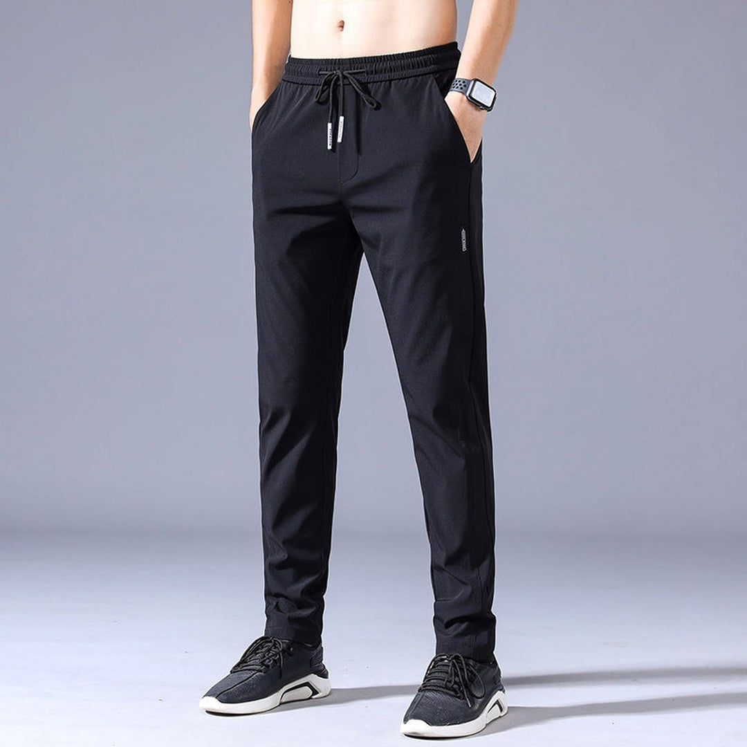 Man wearing the Vincent men's stretch pants, front view