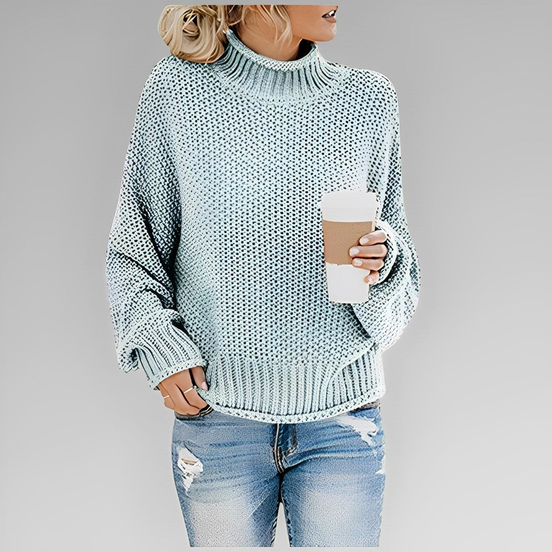 Woman wearing the Vivienne women's sweater, flatlay view