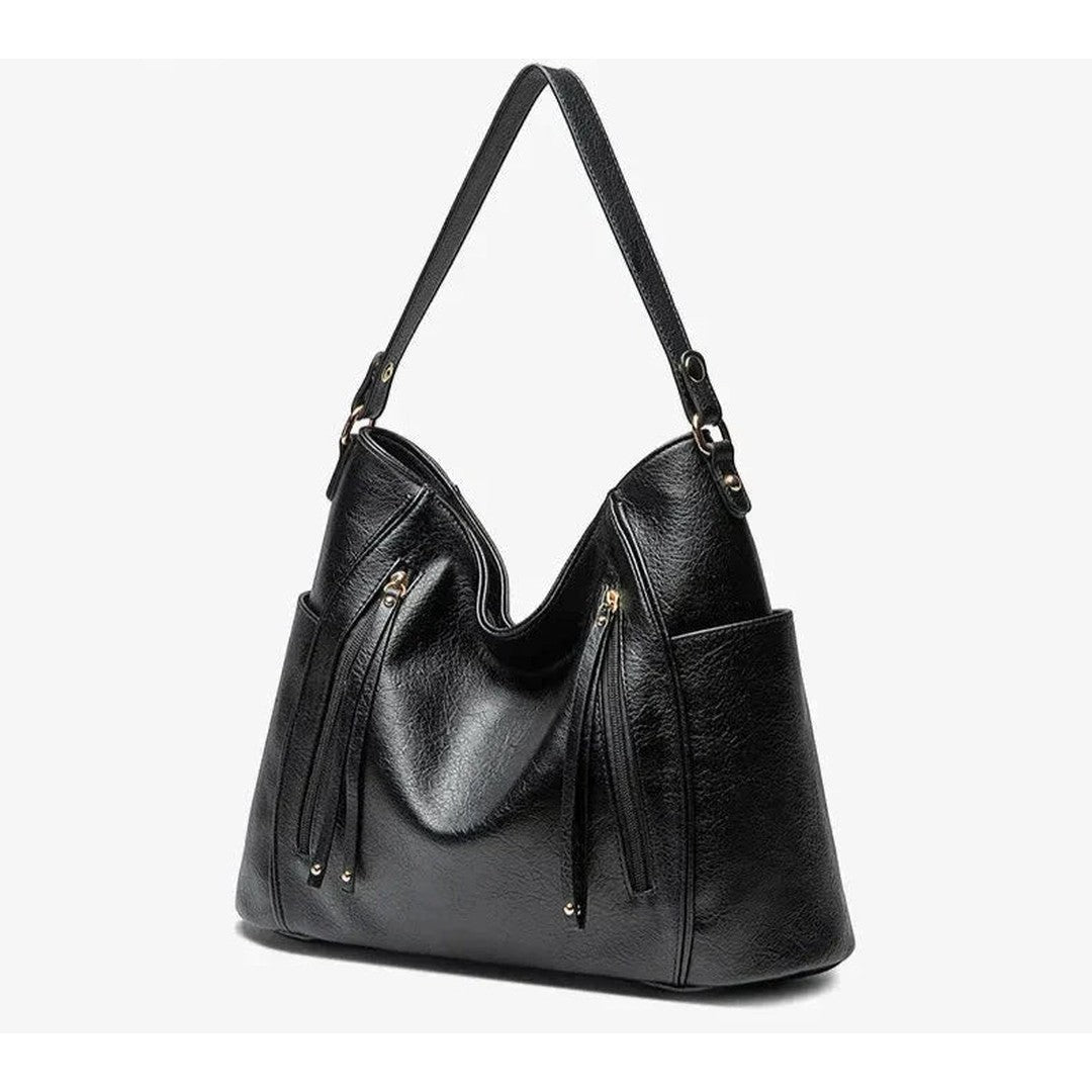 Woman wearing the Ximena women's elegant bag, detail view