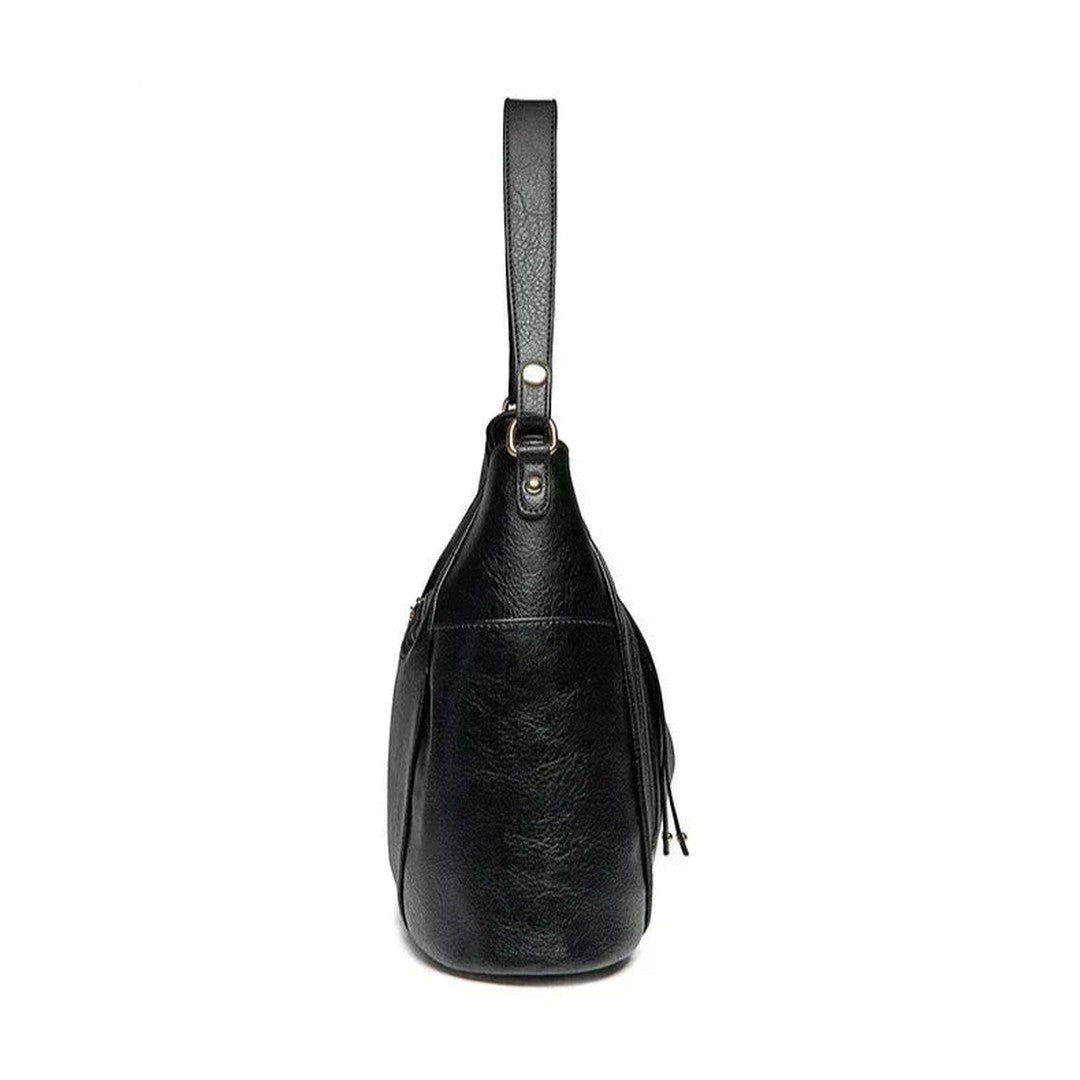 Woman wearing the Ximena women's elegant bag, model view