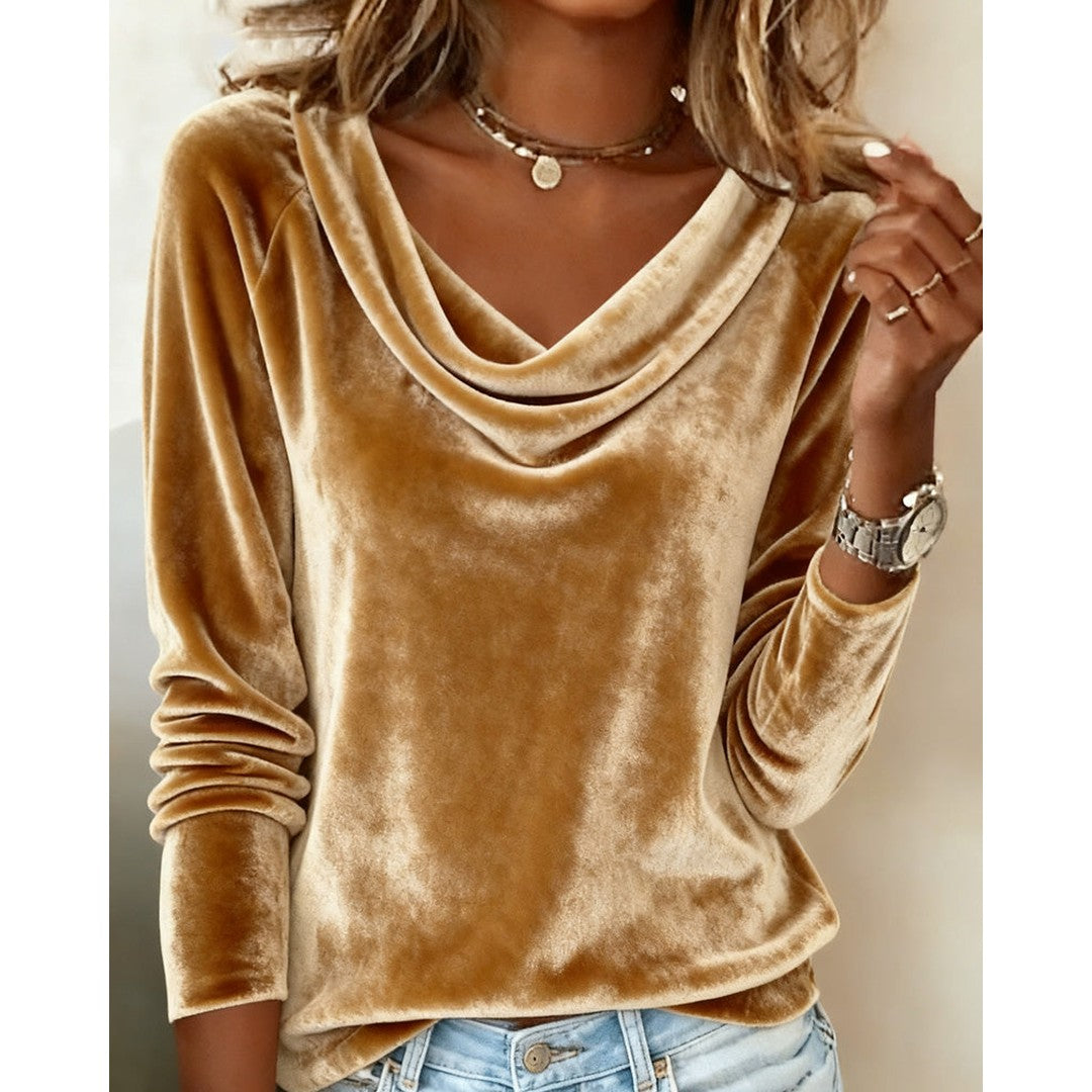 Woman wearing the Aaliyah women's chic blouse, side view