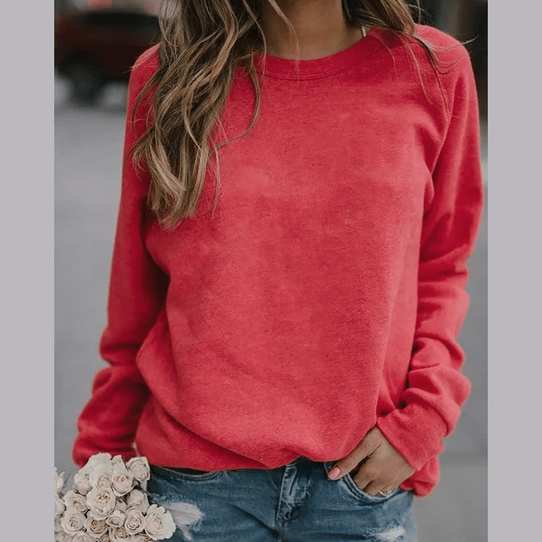 Woman wearing the Alba women's sweater, back view