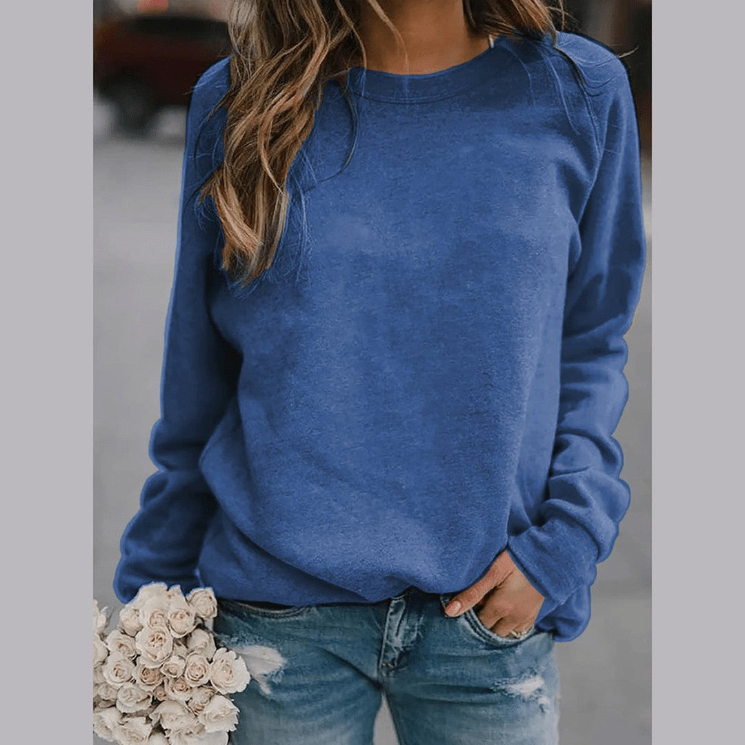 Woman wearing the Alba women's sweater, flatlay view