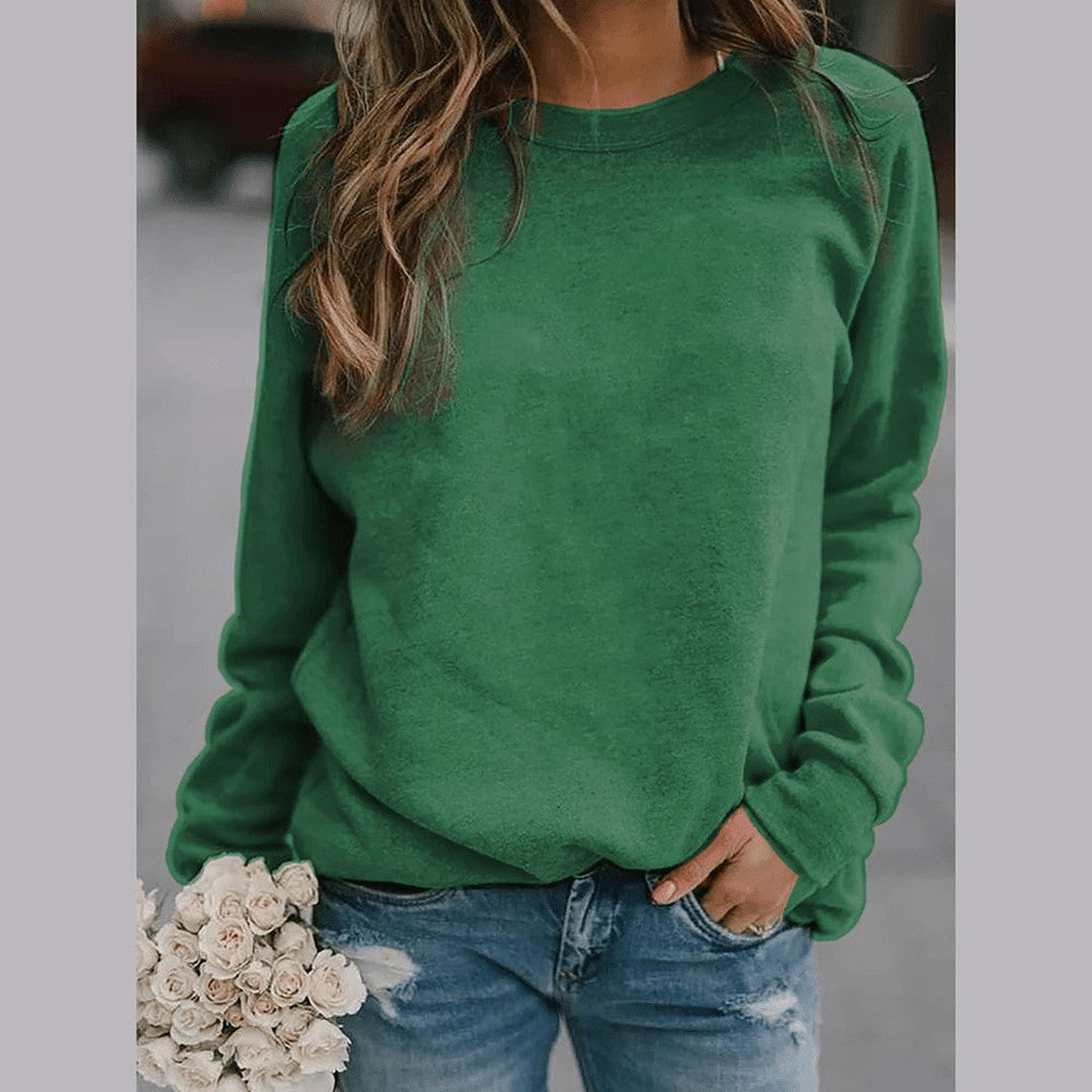 Woman wearing the Alba women's sweater, front view