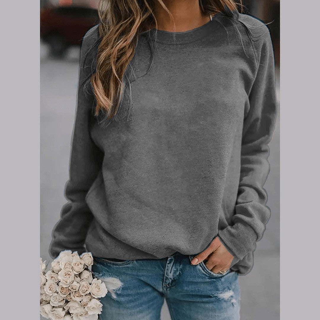 Woman wearing the Alba women's sweater, model view