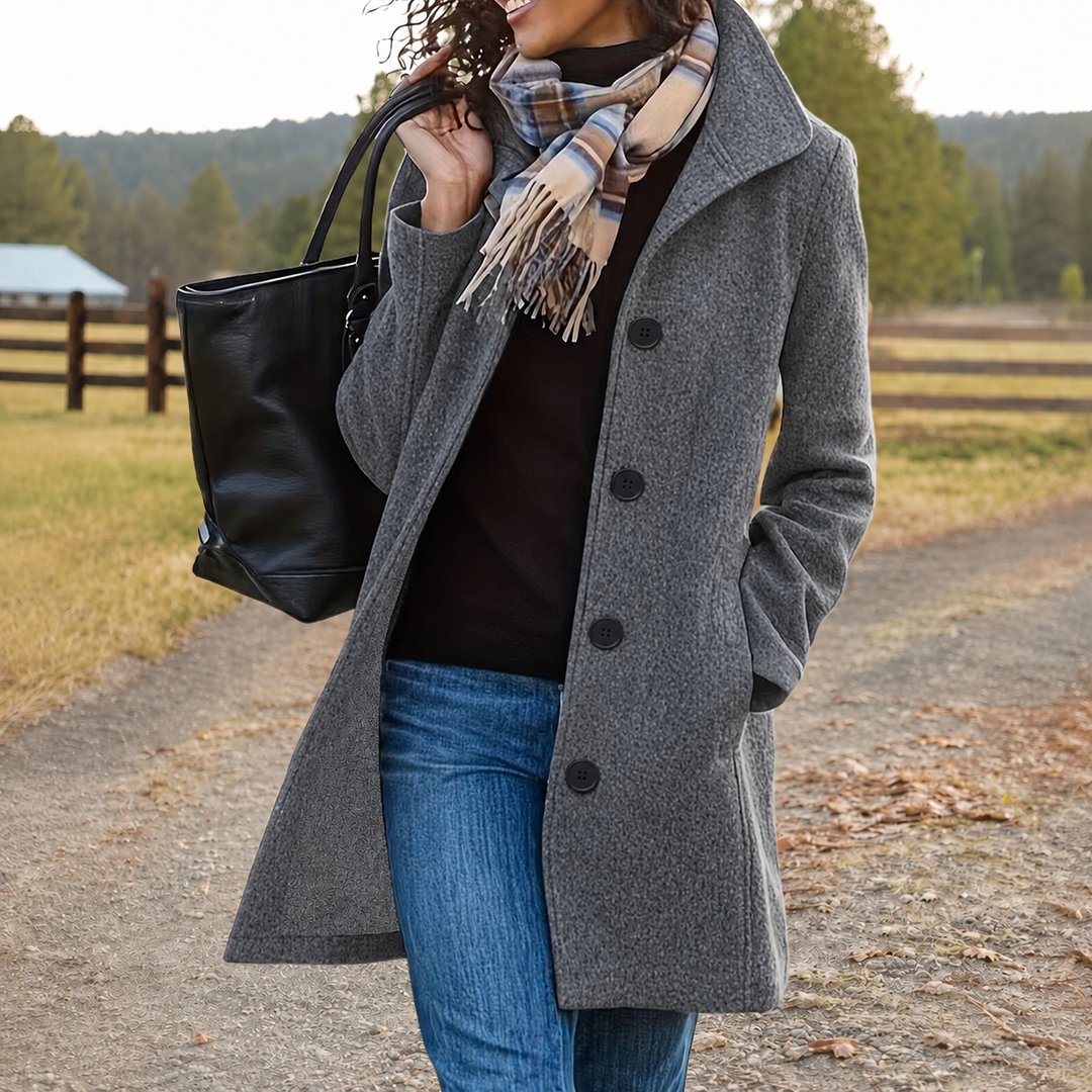 Woman wearing the Allison women's button-up coat, model view