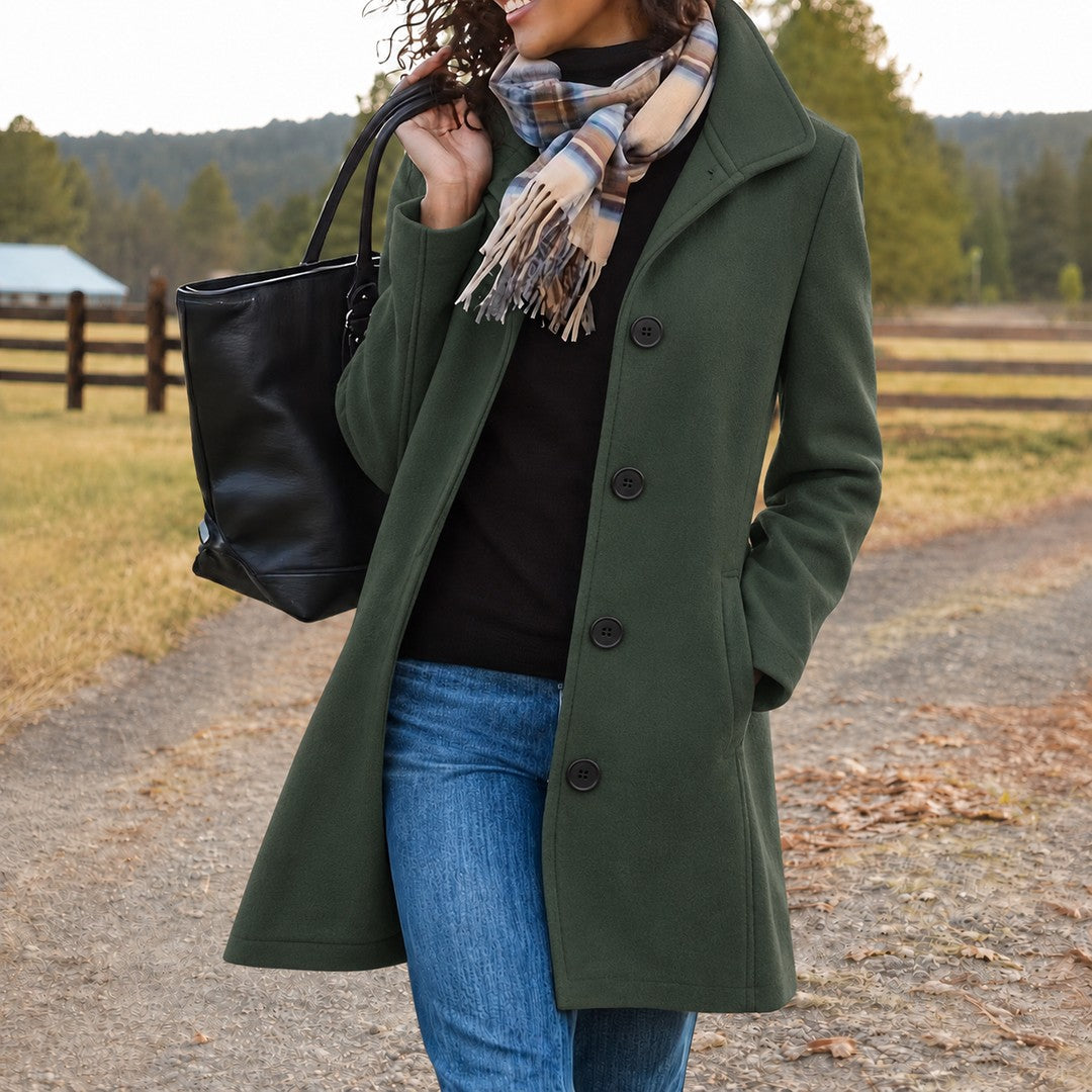 Woman wearing the Allison women's button-up coat, side view