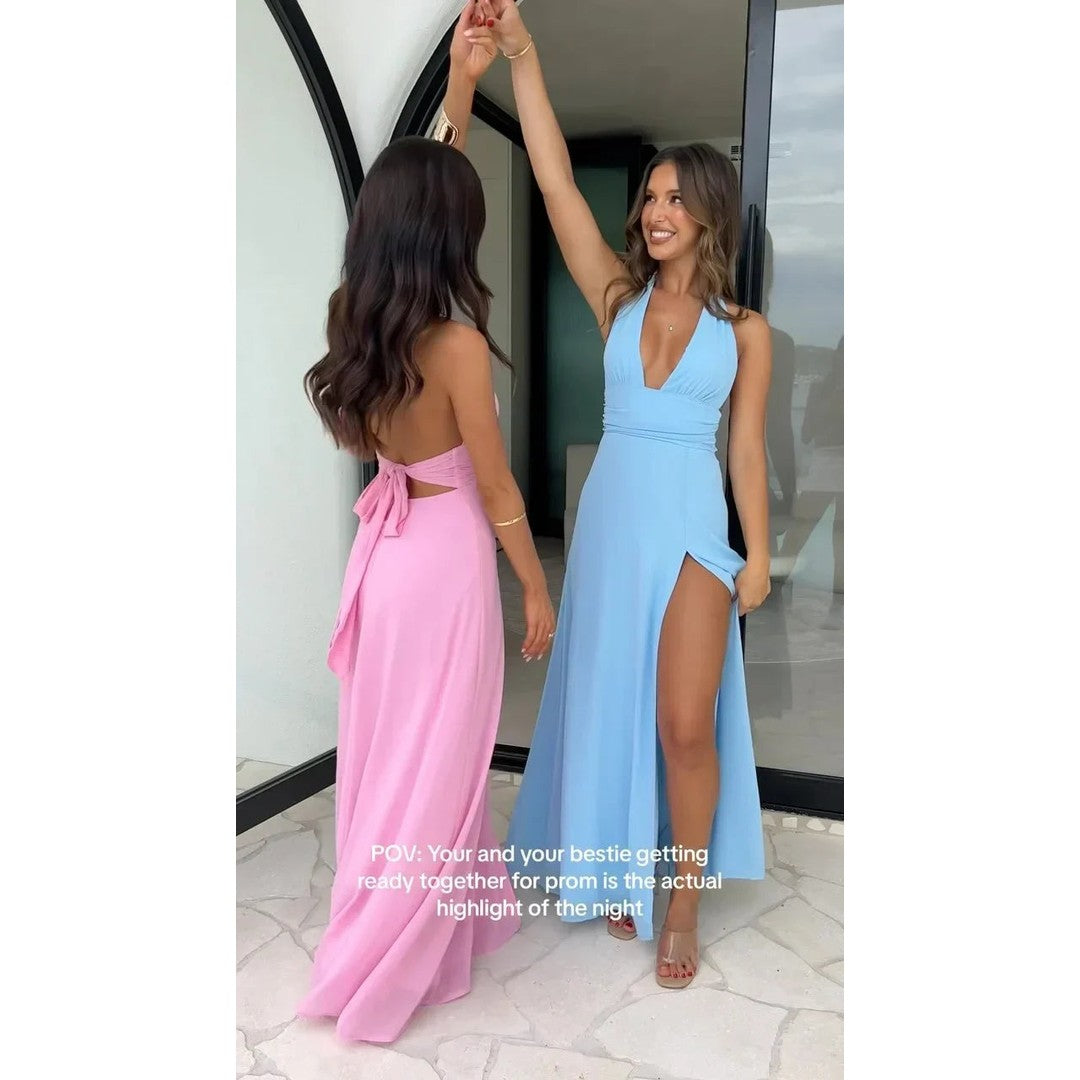 Woman wearing the Amara women's v-neck dress, back view