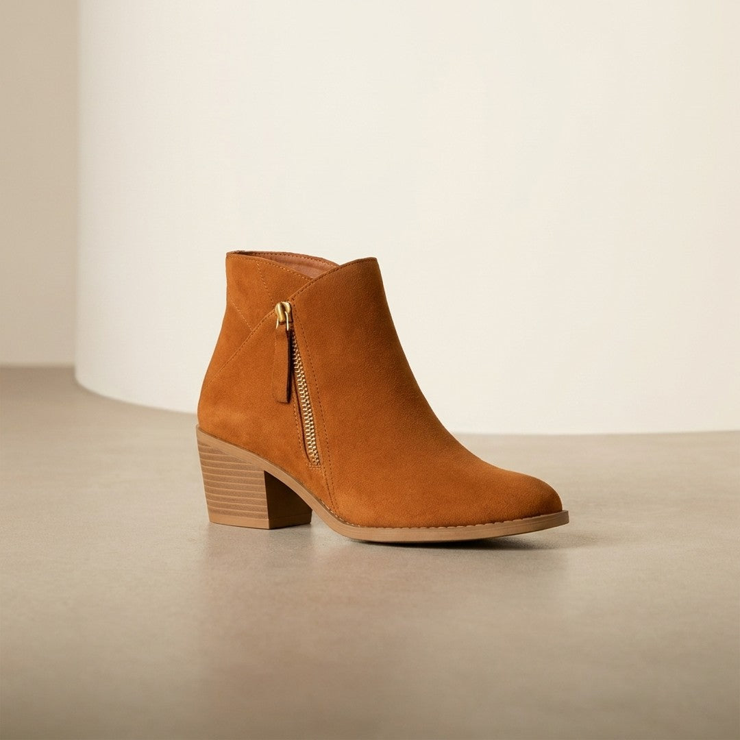 Woman wearing the Anais women's casual zip-up boots, back view