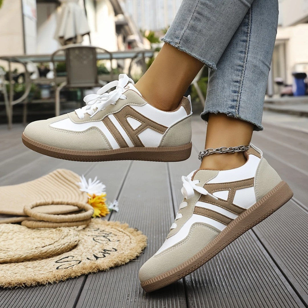 Woman wearing the Annabel women's wide-leg sneakers, side view