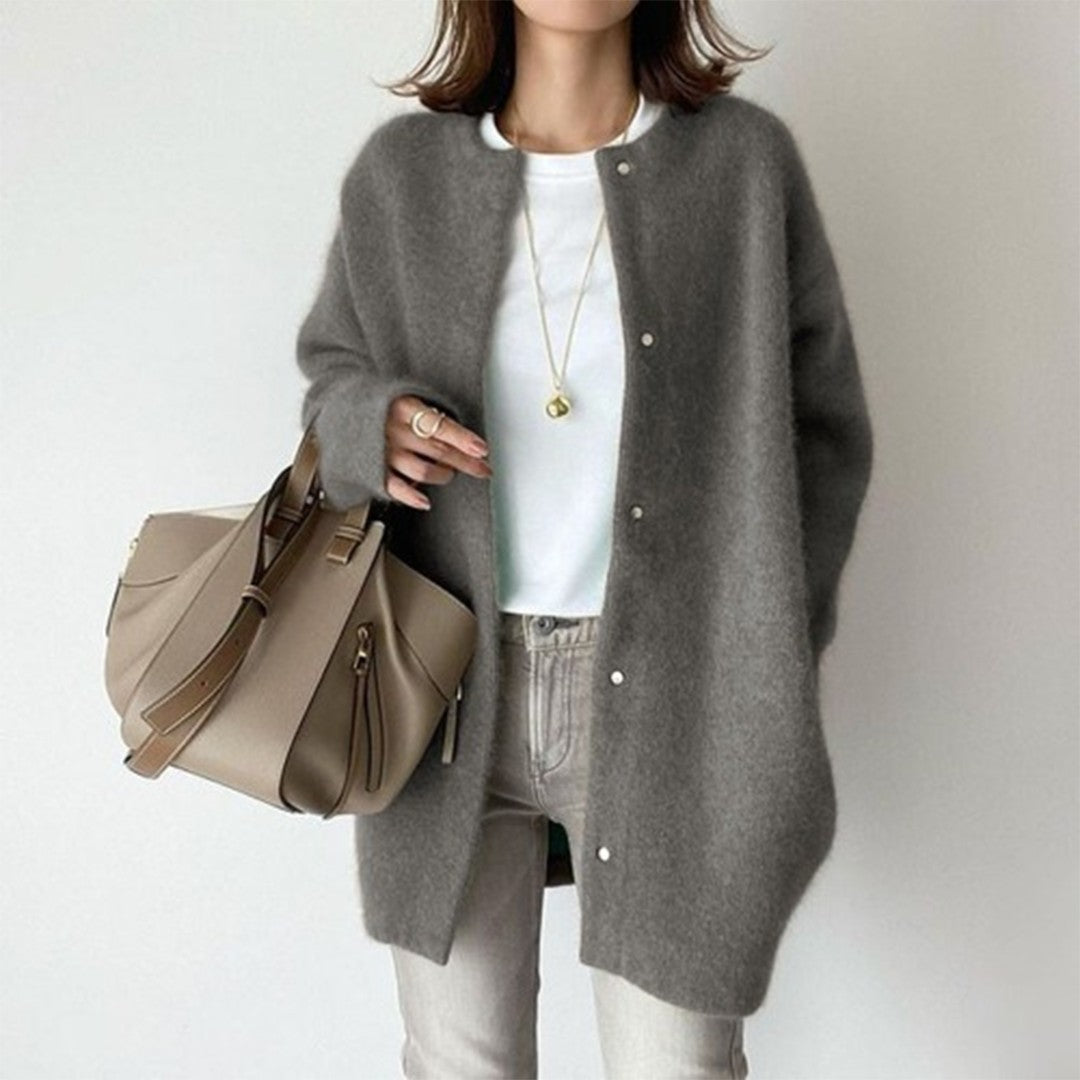 Woman wearing the Aurora women's high-waist coat, model view