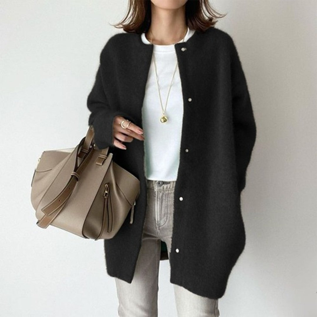 Woman wearing the Aurora women's high-waist coat, side view