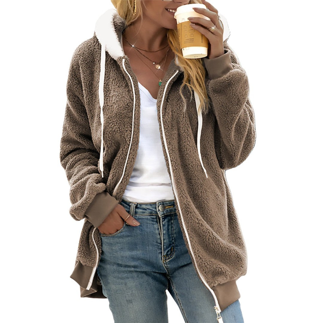 Woman wearing the Ayla women's hooded zip-up jacket, side view