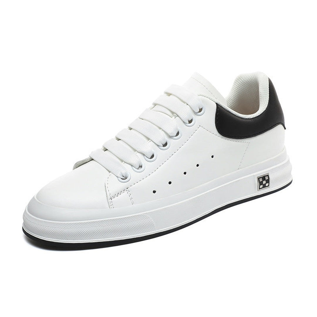 Man wearing the Baird men's sneakers, front view