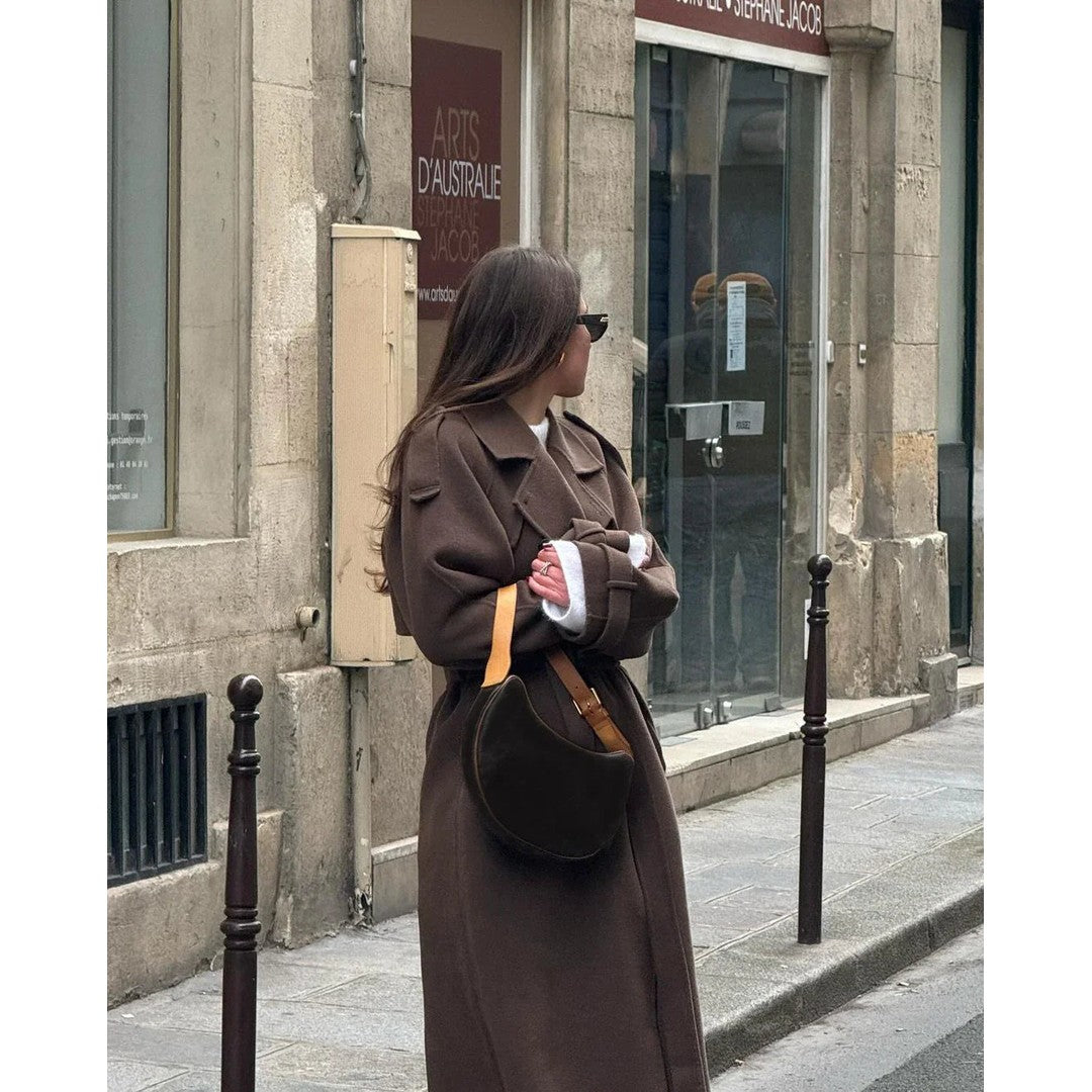 Woman wearing the Belen women's coat, side view