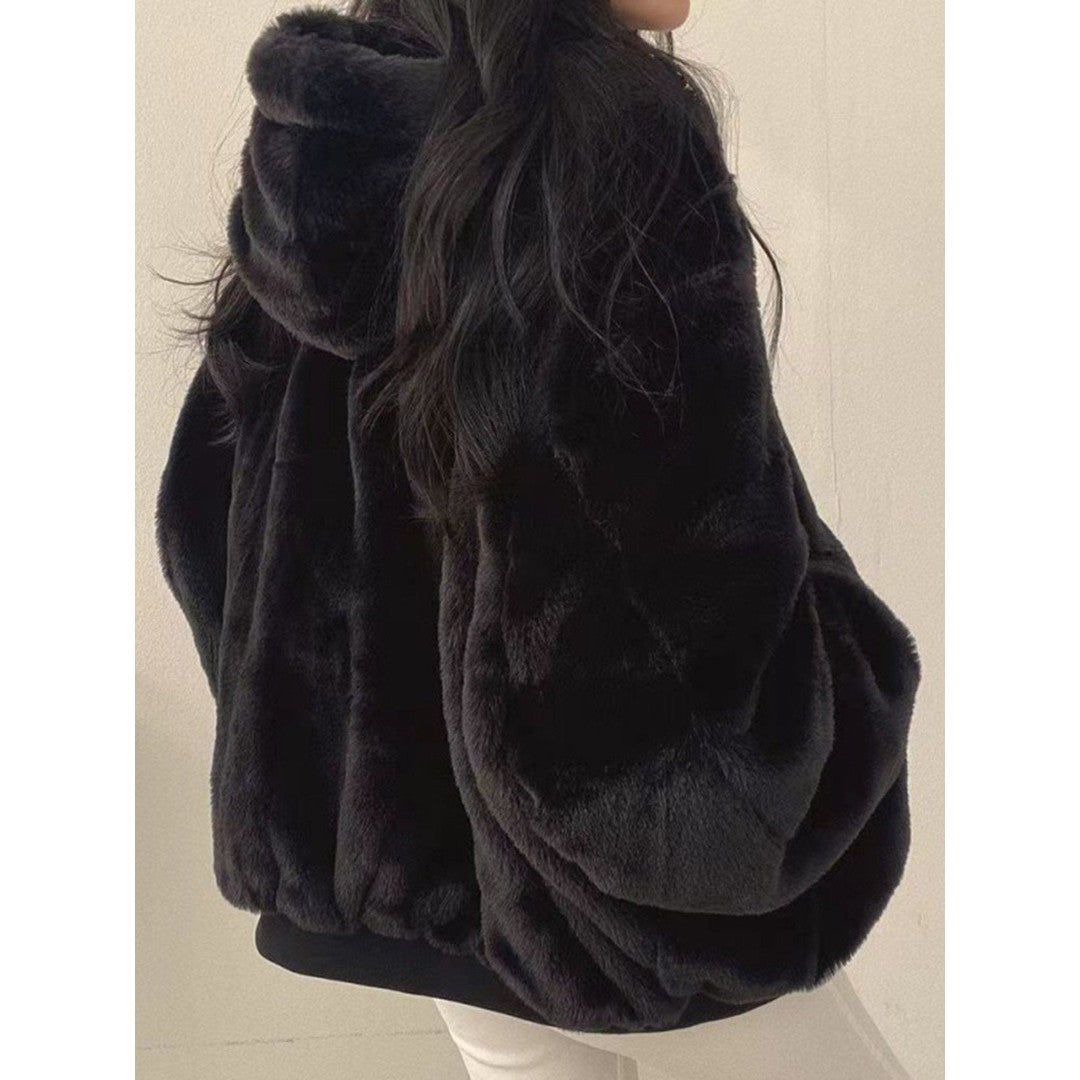 Woman wearing the Bexley women's fleece hoodie, side view