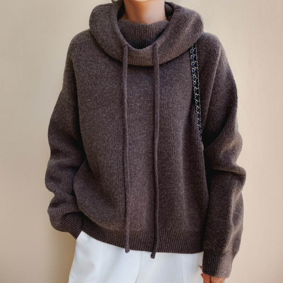 Woman wearing the Briar women's knit hoodie, side view