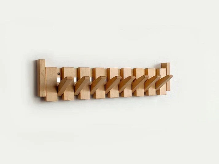Wooden wall coat rack with fold-away piano key hooks - product photo 7