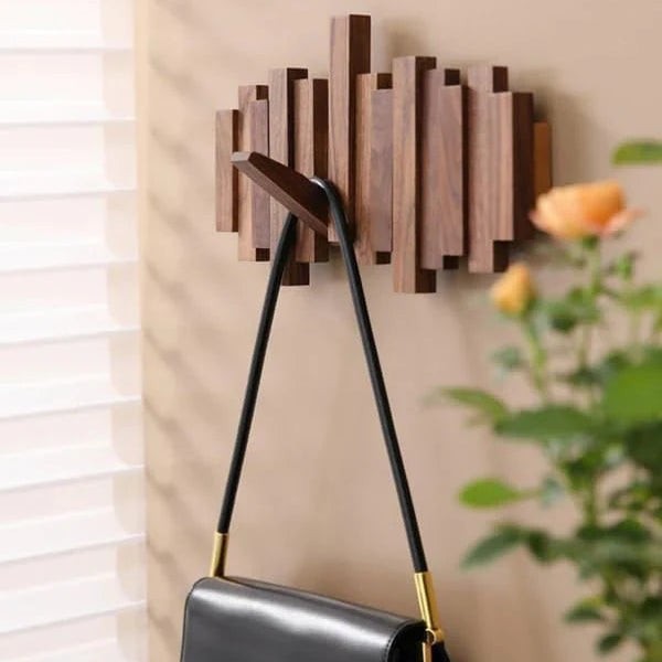 Solid wood wall coat rack with fold-away piano key hooks - product photo 6