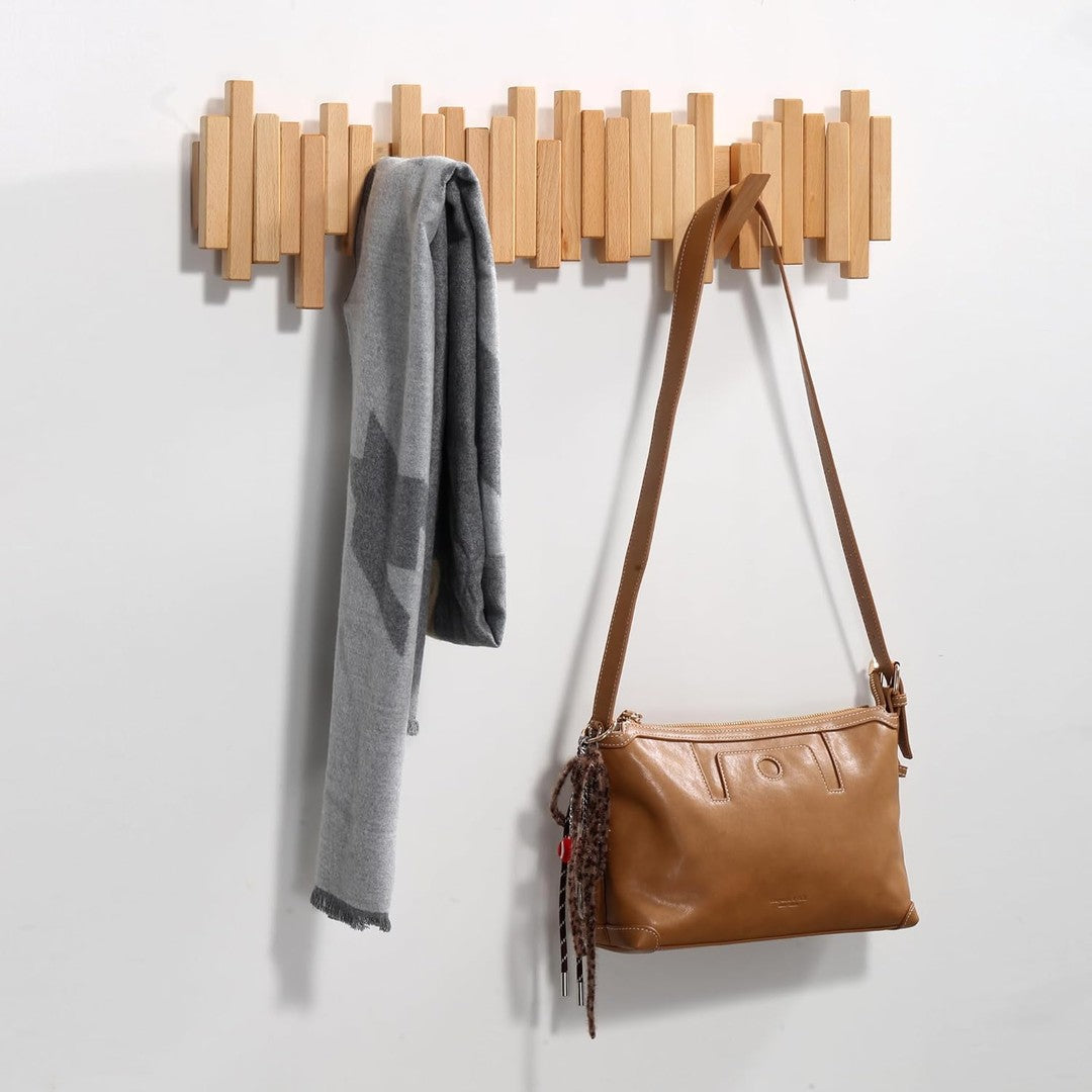 Solid wood wall coat rack with fold-away piano key hooks - product photo 7