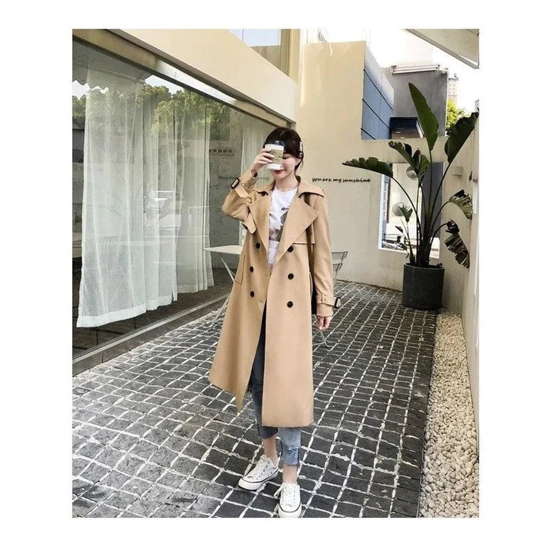 Woman wearing the Cadence women's long-sleeve trench coat, 14 view