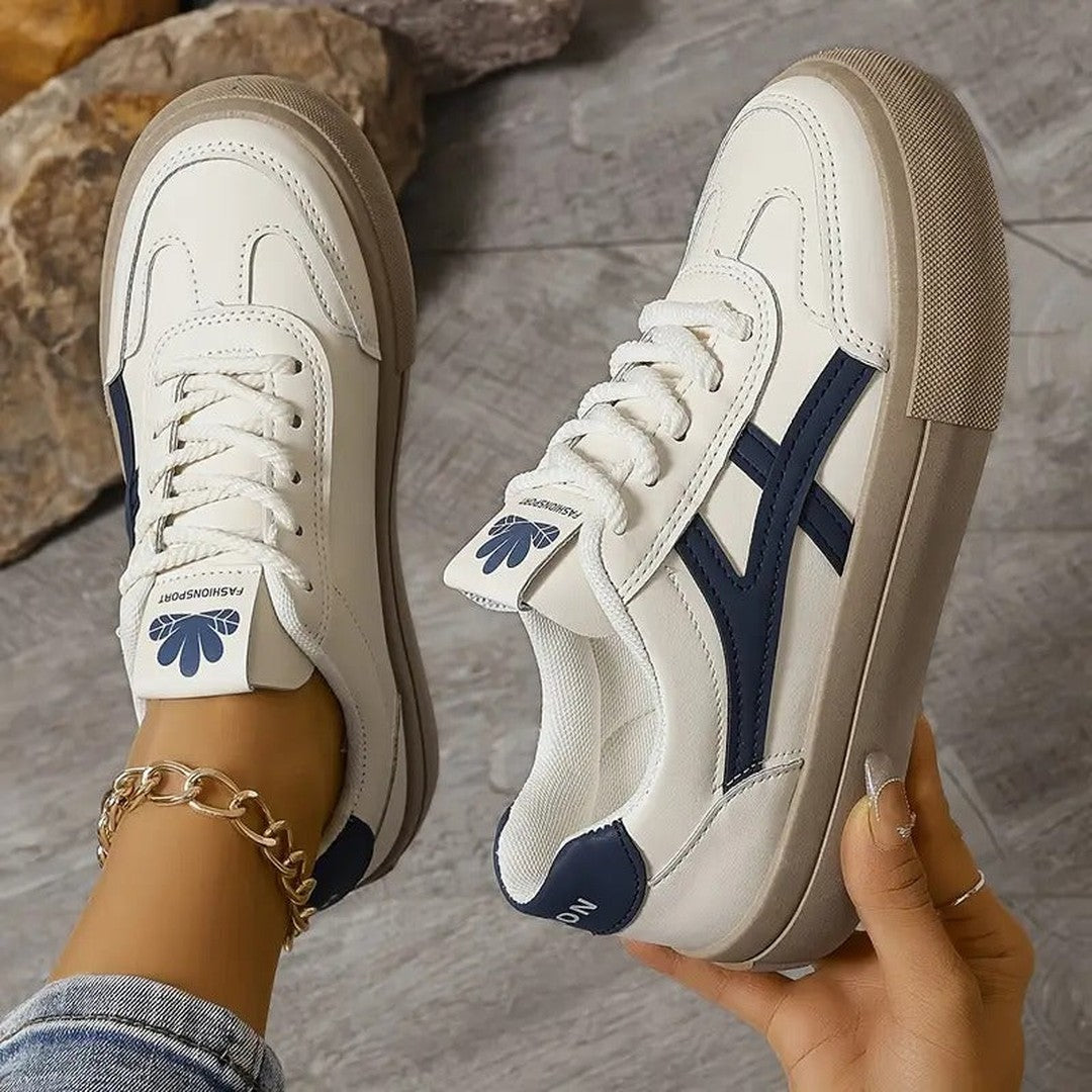 Woman wearing the Camille women's casual sneakers, back view