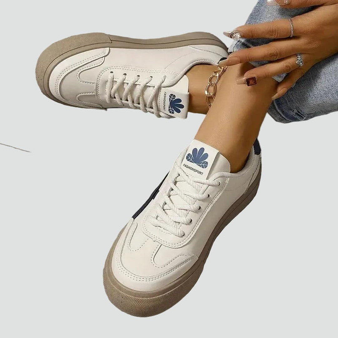 Woman wearing the Camille women's casual sneakers, front view