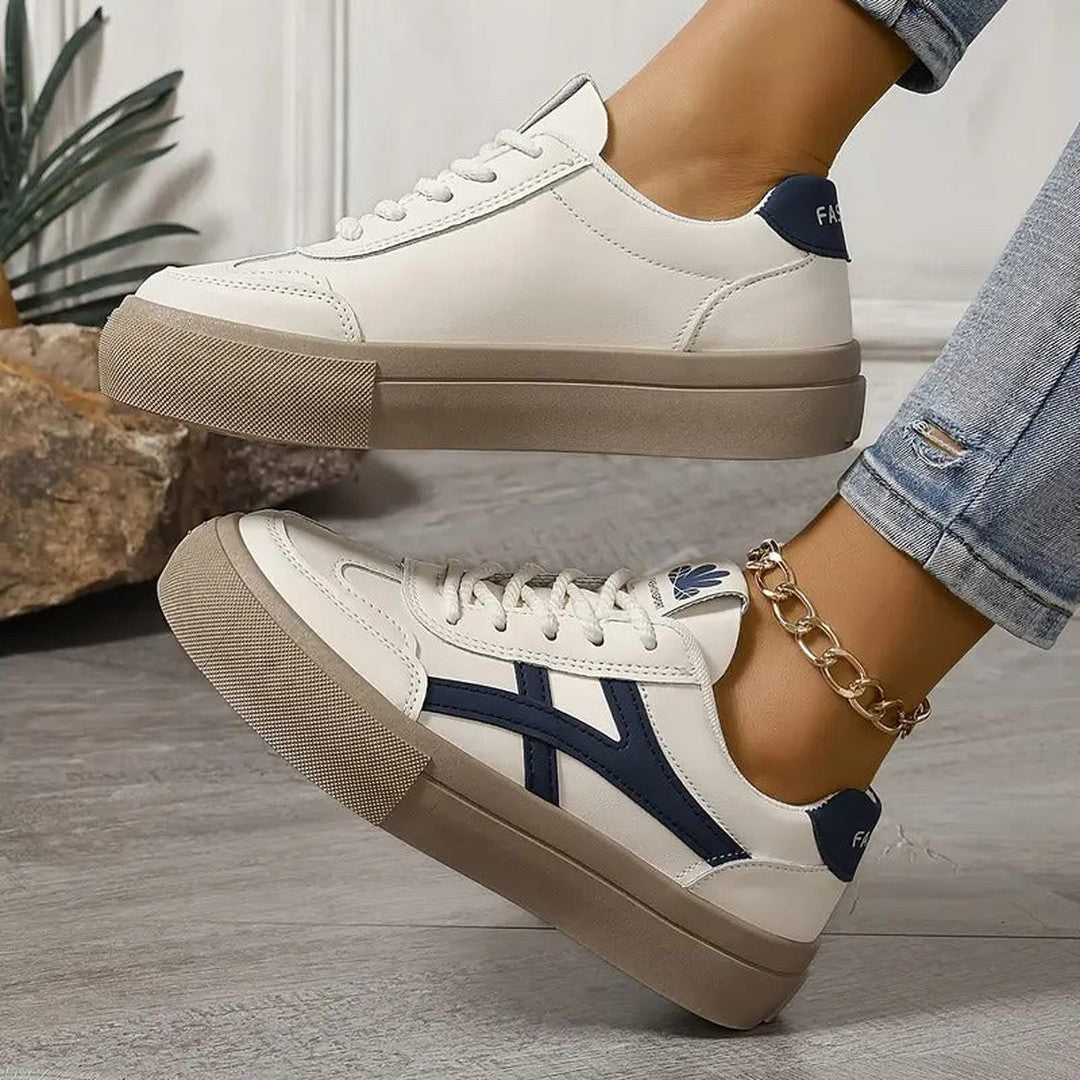 Woman wearing the Camille women's casual sneakers, side view
