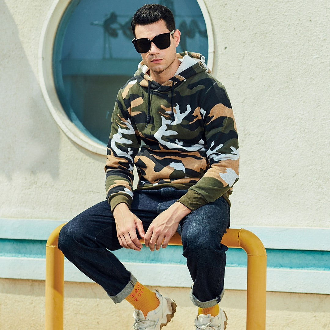 Man wearing the Carter men's hoodie, front view