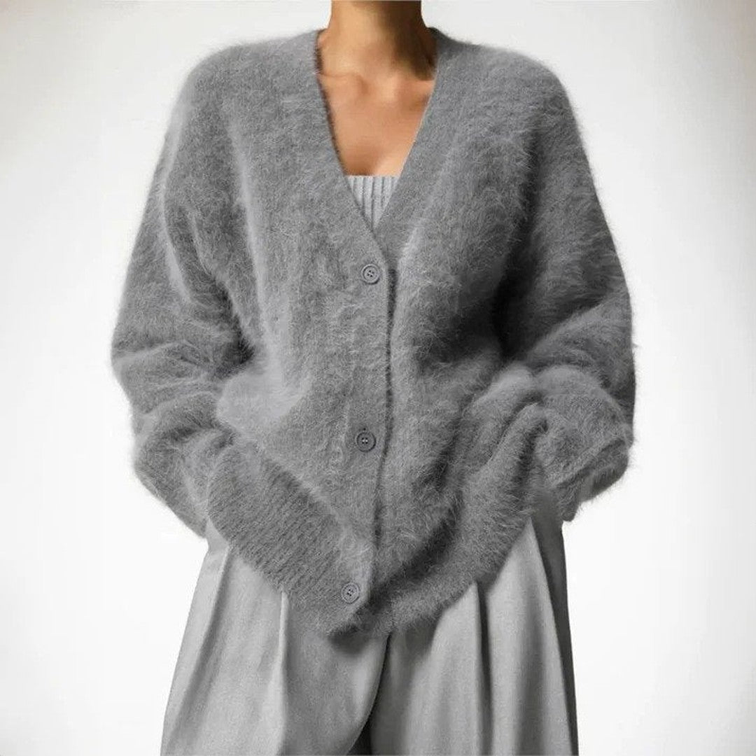 Woman wearing the Celeste women's knit elegant cardigan, back view
