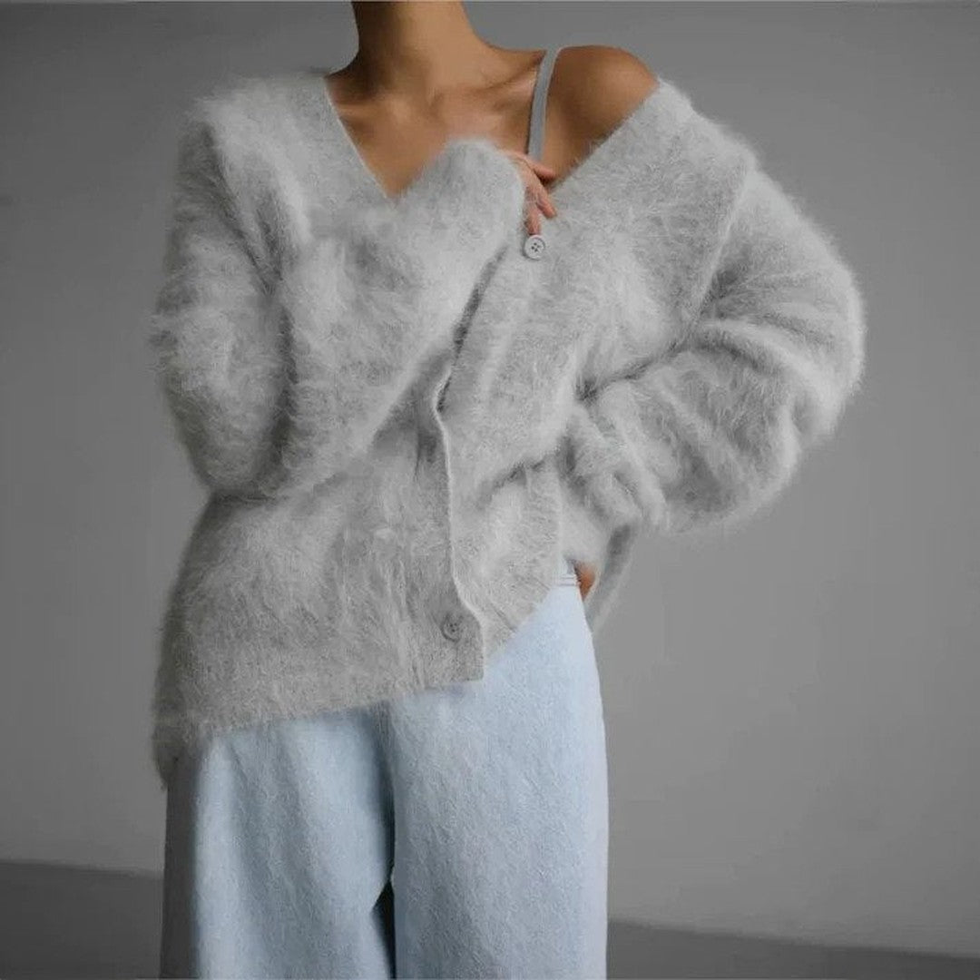 Woman wearing the Celeste women's knit elegant cardigan, detail view