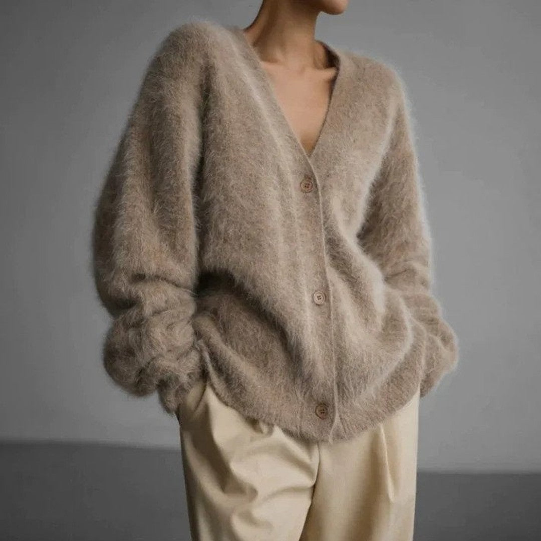 Woman wearing the Celeste women's knit elegant cardigan, front view